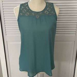 Teal flowy blouse with gorgeous neck detail.